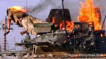 From Saddam's execution to the rise and fall of ISIS: Stunning images illustrate America's two decades in Iraq as final US troops leave today