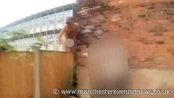 'There's a big drop. Please love!': Naked Wigan criminal pleads with police as he's caught red-handed on fence in raid