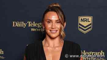 Brisbane Broncos player Julia Robinson shows off her elaborate tattoos and risks a wardrobe malfunction in very daring plunging gown at the Dally M Awards