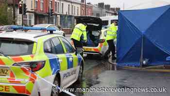 Bolton cordon as police tape off scene near Aldi with forensic tent