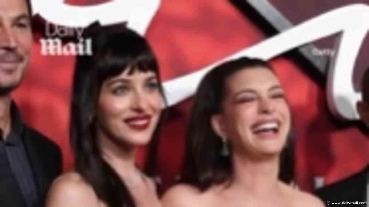 Dakota Johnson appears to run out of patience and says 'I'm gonna leave' as Anne Hathaway takes charge and directs photographers on Verity red carpet