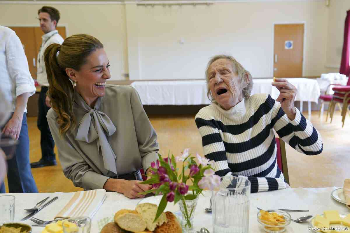 Crisps and kerb-jumping as Kate joins village hall group for lunch