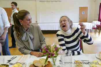 Crisps and kerb-jumping as Kate joins village hall group for lunch