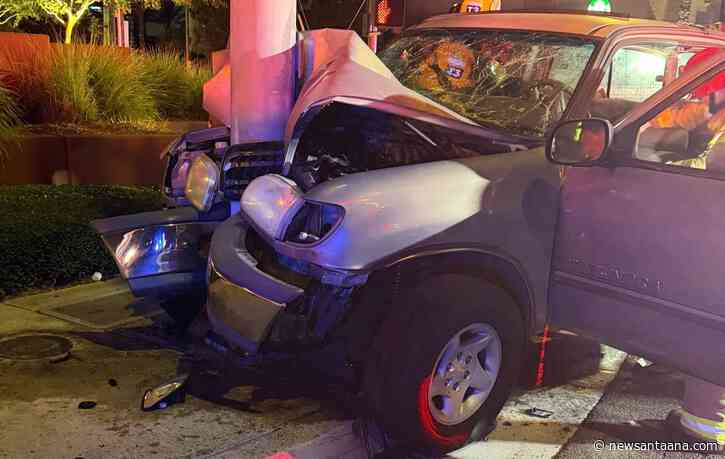 Two trapped after pick-up truck slams into light pole in Orange; firefighters perform heavy rescue