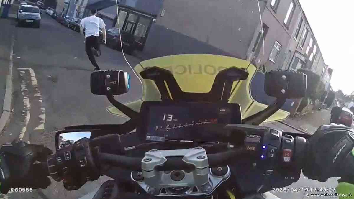 Man tries to sprint away from police motorbike in Swansea after crashing car into officer