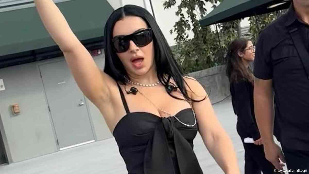 Charli XCX parties with Troye Sivan in behind-the-scenes snaps after their viral on stage VMAs moment with 'confused' Madonna