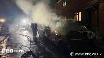 Fire reaches home after spreading through vehicles