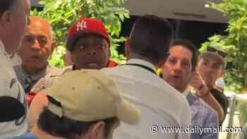 Spike Lee has to be held back from confronting baseball fan in heated altercation at Red Sox-Yankees playoff game