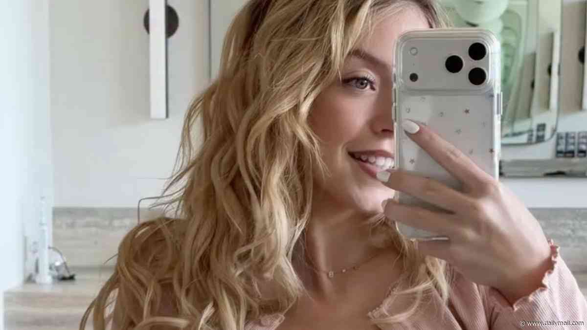 Sydney Sweeney promotes 'nude' lingerie line as she spills out of lacy bra in jaw-dropping video