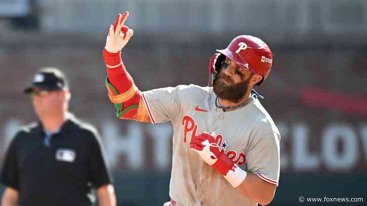 Phillies force Game 3 as Kyle Schwarber, Bryce Harper go back-to-back and Alec Bohm homers in 10th vs Braves