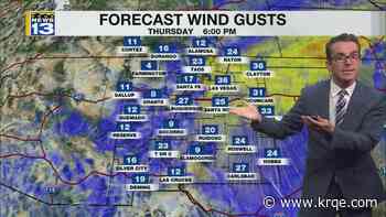 Storms clearing out, gusty and mild weather