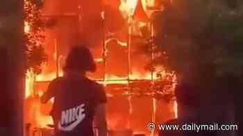 Chaos in France as masked rioters torch schools and douse teachers in petrol after left-wing mayor told protesters 'violence can be legitimate'