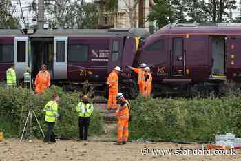 Train ‘sped up after acknowledging red signal’ before Bedford crash – report