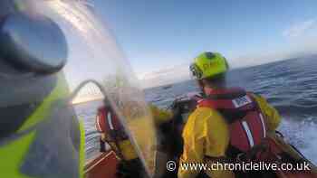 Three children among five rescued after car caught in tide drifts off Holy Island Causeway