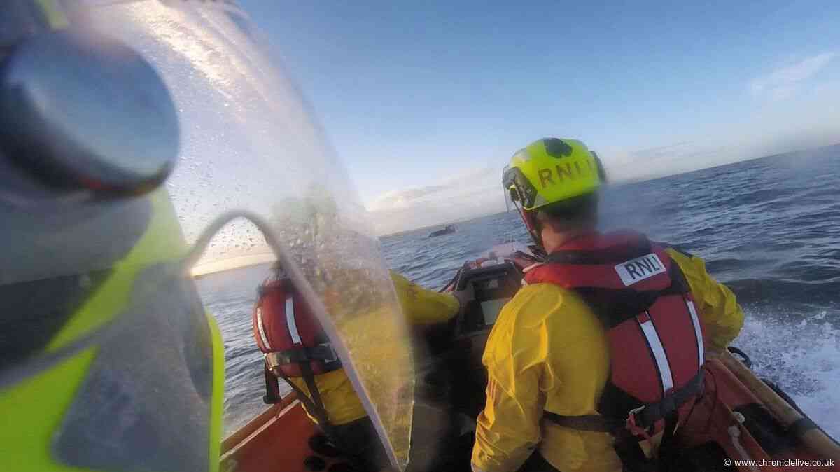Three children among five rescued after car caught in tide drifts off Holy Island Causeway