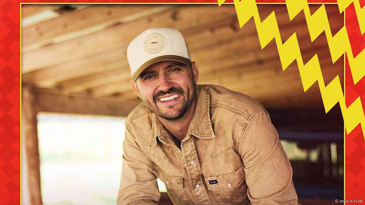 Blaskapelle auch am Start: Country-Superstar singt US-Hymne beim NFL Munich Game