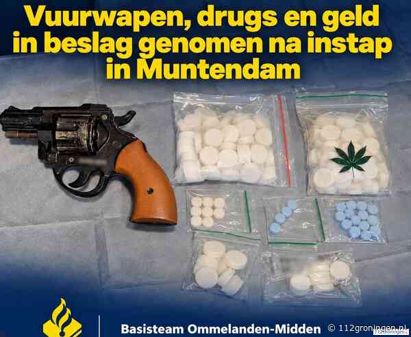 Vuurwapen, drugs en geld in beslag genomen bij inval