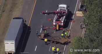 Trailer blocks lanes on I-540 near Falls of Neuse Road, creating major delays