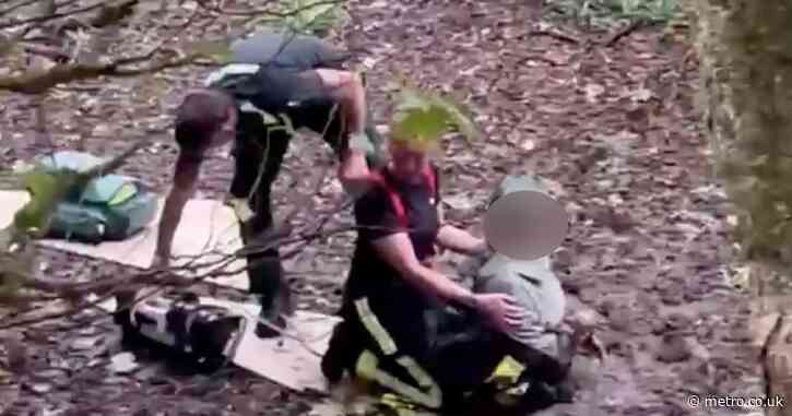 Arsenal fan storms out of home after loss only to rescue woman stuck in mud