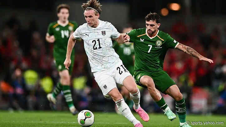 Republic of Ireland and Austria draw in game briefly halted by protests
