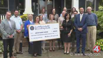 Kevin Guest House receives donation from Women's Charity Committee