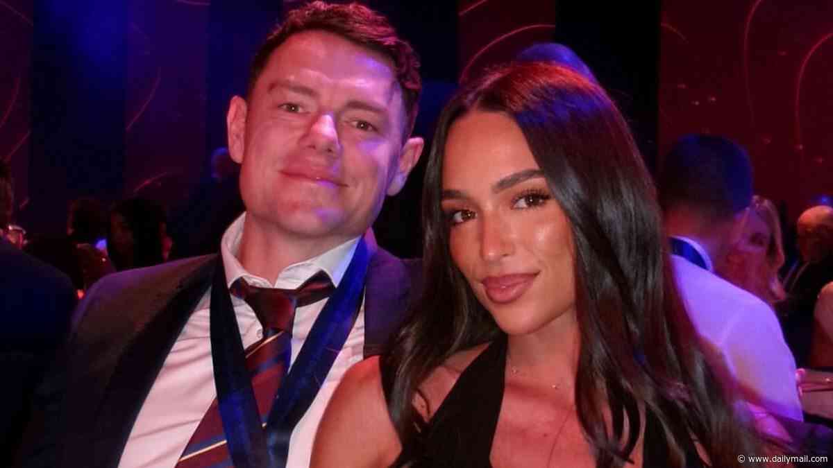 Like the cat that got the cream! Lachie Neale's new girlfriend Emma Field turns up the heat in a very revealing dress at Brisbane Lions' best and fairest - one year after ex-wife Jules attended the event, unaware her marriage was about to fall apart