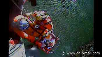 Fisherman who became trapped under massive boulder reveals he used Siri to call 911 as he describes miracle survival