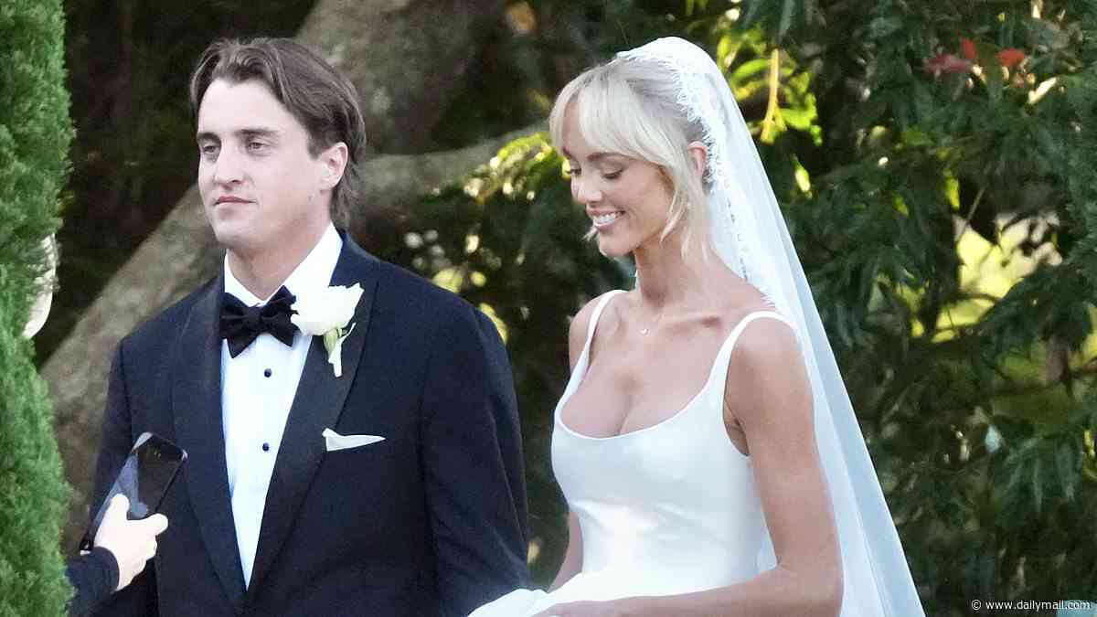 Annie Knight criticised for wearing a white wedding dress and a veil as she ties the knot with fiancé Henry Brayshaw: 'Scarlet would have been more appropriate'