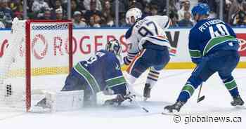McDavid comes up big as Oilers down Canucks 9-7