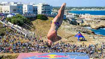 'I thought I'd NEVER dive again': How adrenaline junkie Aidan Heslop made comeback after 444-DAY back surgery recovery to become Red Bull Cliff Diving World Series champion