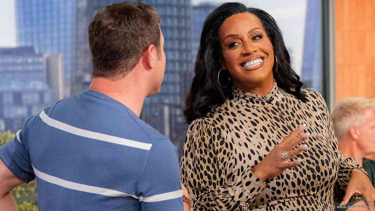 Alison Hammond is seen clutching her chest as she is rushed out of This Morning studio live on air after suddenly falling ill