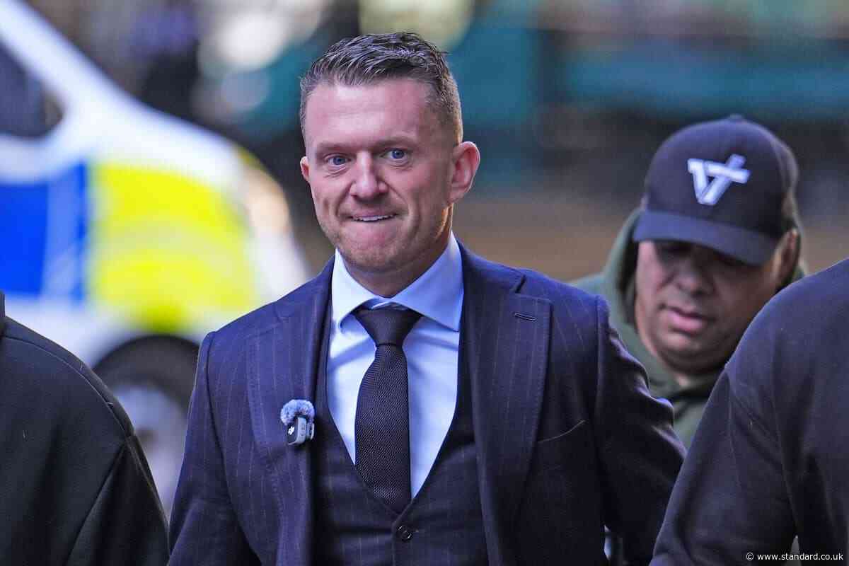 Tommy Robinson in the dock at London court accused of harassing two journalists