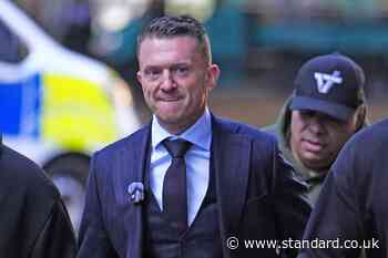 Tommy Robinson in the dock at London court accused of harassing two journalists