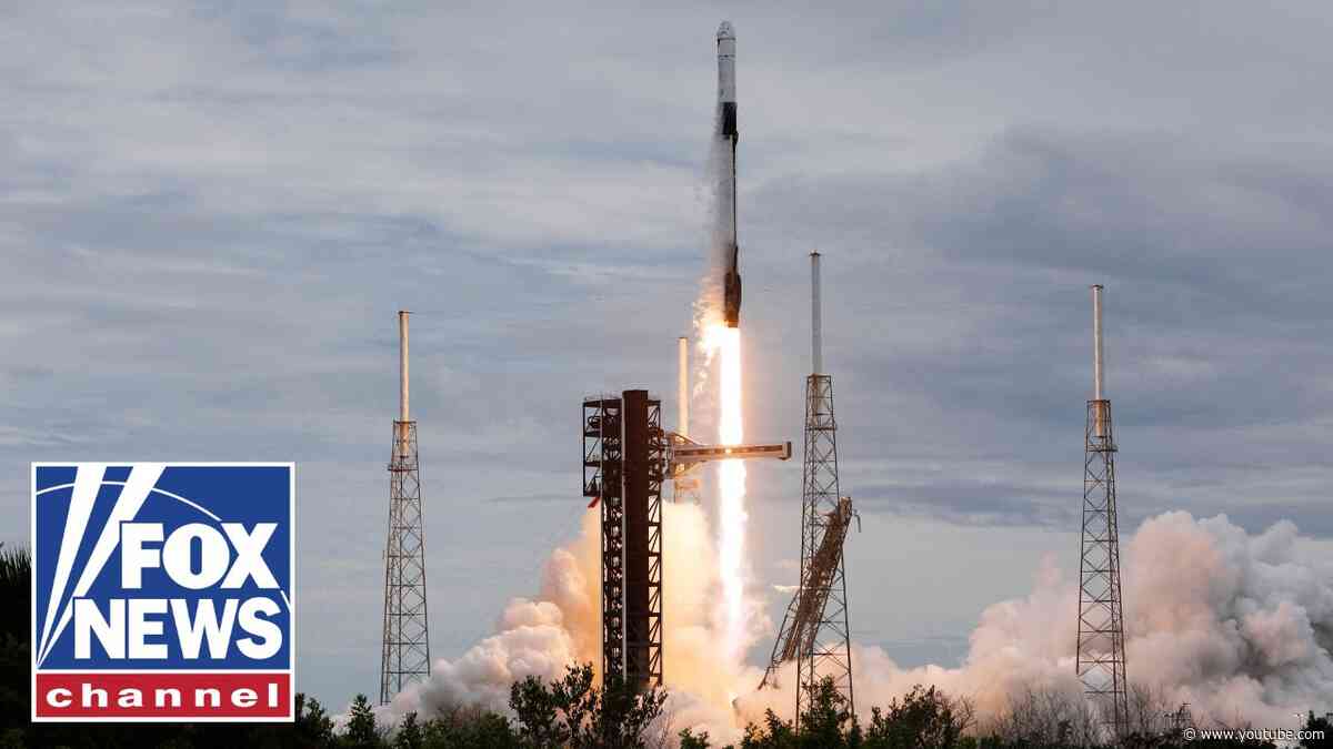 MISSION MILESTONE: SpaceX Dragon capsule docks at the International Space Station