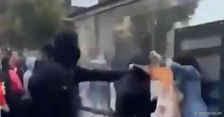 Shocking moment woman is attacked with makeshift flamethrower during France riots
