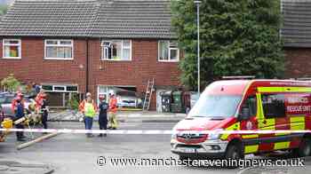 Mossley crash RECAP as police tape off street after car ploughs into house
