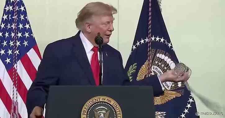 Trump admits he’s ‘not a big drinker of water’ then dumps glass mid-speech