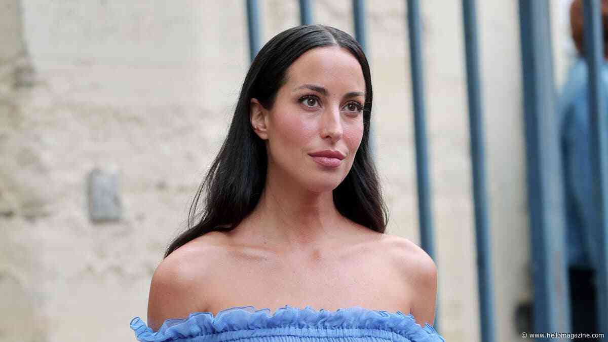 Ines de Ramon shows off her fun side as she flirts for the camera in sheer dress