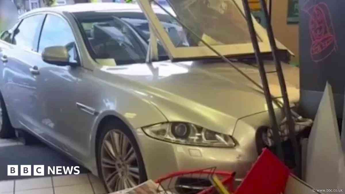 Car crashes into viral shop shutters where gran was hoisted into the air