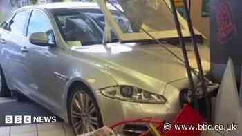 Car crashes into viral shop shutters where gran was hoisted into the air