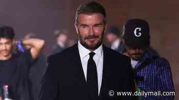 David Beckham leads his family in supporting wife Victoria at her Paris Fashion Week show - as estranged son Brooklyn snubs the event following the footballer's olive branch