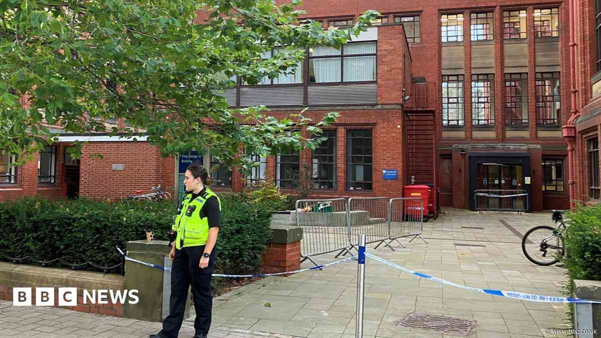 Man arrested as university buildings cordoned off