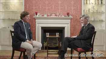 Moment Tucker Carlson tells an incredulous Jacob-Rees Mogg that Britain would have been better off LOSING World War Two - but says he is not a Nazi supporter