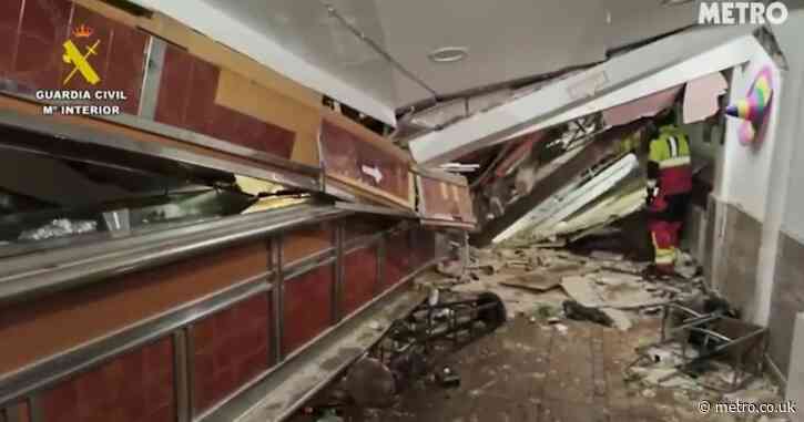 12 injured and dozens more trapped after Spanish tourist bar collapses