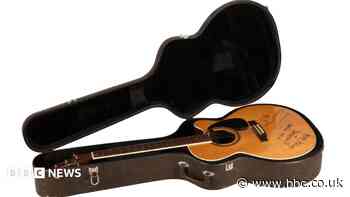 Oasis acoustic guitar sells for record price
