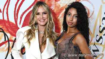 Heidi Klum looks elegant in all white outfit as she brings her daughter Lou Sulola Samuel, 16, to the Vivienne Westwood Paris Fashion Week show