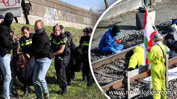 Actievoerders bezetten spoor bij Herveld, politie grijpt in