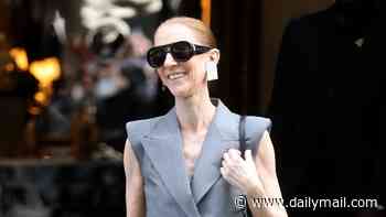 Celine Dion continues her fashion parade in a chic grey look as she waves to fans while leaving her hotel in Paris