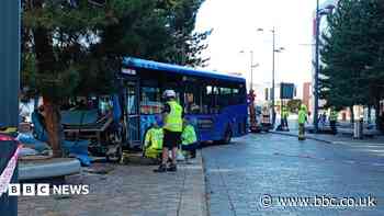 Reports of injuries after bus crashes into tree