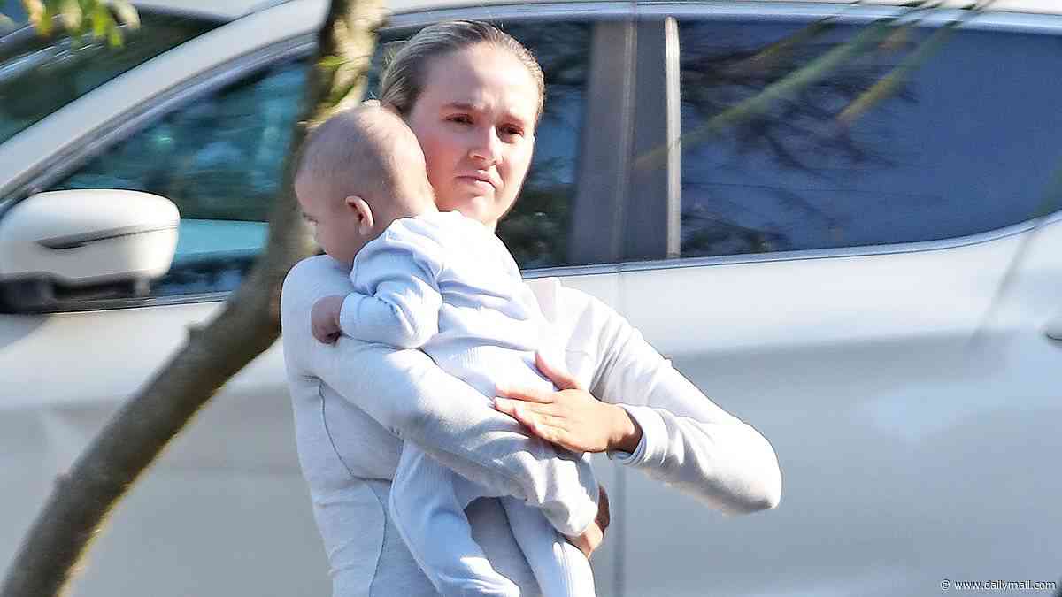 Molly Mae Hague cradles son Midas as she heads for a pub lunch with Tommy Fury after revealing she's battling 'mum guilt'